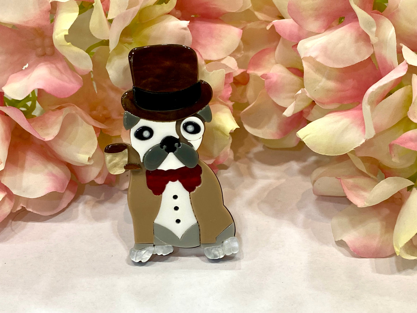 Broche perro detective