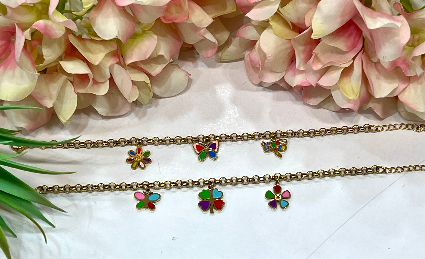 Pulseras acero colgantitos color