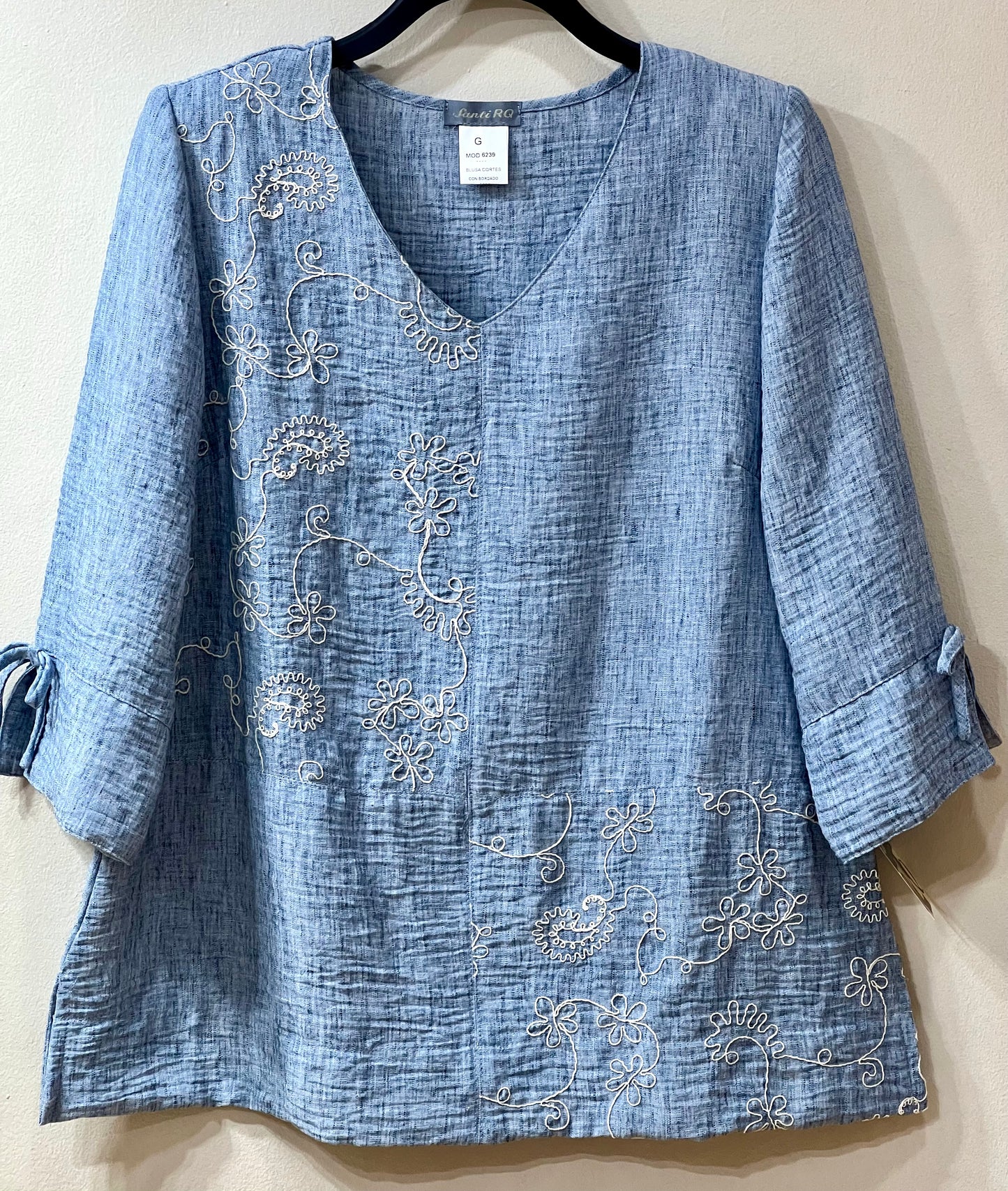 Blusa bordados laterales